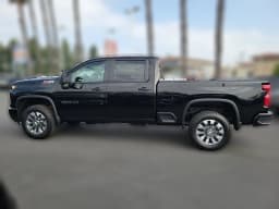Chevrolet Silverado 2500HD Custom 4WD Crew Cab 159" 2026 — side view