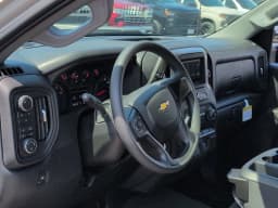 Chevrolet Silverado 2500HD Custom 4WD Crew Cab 159" 2026 — side view