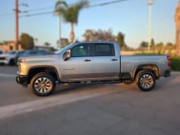 Chevrolet Silverado 2500HD Custom 4WD Crew Cab 159" 2026 — side view