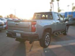Chevrolet Silverado 2500HD Custom 4WD Crew Cab 159" 2026 — side view