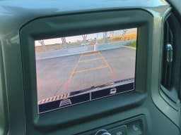 Chevrolet Silverado 2500HD Custom 4WD Crew Cab 159" 2026 — side view