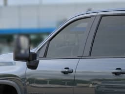 Chevrolet Silverado 2500HD LT 4WD Crew Cab 159" 2026 — side view