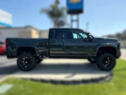 Chevrolet Silverado 2500HD LTZ 4WD Crew Cab 159" 2026 — side view