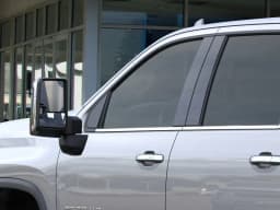 Chevrolet Silverado 2500HD LTZ 4WD Crew Cab 159" 2026 — side view