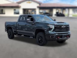 Chevrolet Silverado 2500HD LTZ 4WD Crew Cab 159" 2026 — side view