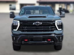 Chevrolet Silverado 2500HD LTZ 4WD Crew Cab 159" 2026 — side view