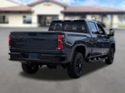 Chevrolet Silverado 2500HD LTZ 4WD Crew Cab 159" 2026 — side view