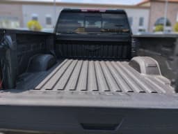 Chevrolet Silverado 2500HD LTZ 4WD Crew Cab 159" 2026 — side view