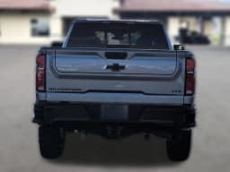Chevrolet Silverado 2500HD LTZ 4WD Crew Cab 159" 2026 — side view