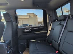 Chevrolet Silverado 2500HD LTZ 4WD Crew Cab 159" 2026 — side view