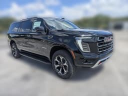 GMC Yukon XL AT4 4WD 4dr 2026 — side view