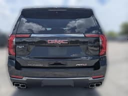 GMC Yukon XL AT4 4WD 4dr 2026 — side view