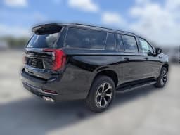 GMC Yukon XL AT4 4WD 4dr 2026 — side view