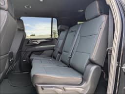 GMC Yukon XL AT4 4WD 4dr 2026 — side view