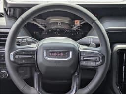 GMC Yukon XL AT4 4WD 4dr 2026 — side view
