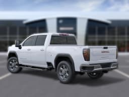 GMC Sierra 2500HD SLT 4WD Crew Cab 159" 2026 — side view