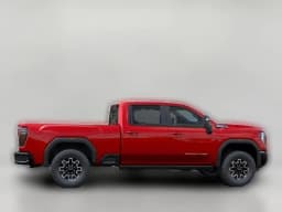 GMC Sierra 2500HD AT4X 4WD Crew Cab 159" 2026 — side view