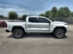 GMC Canyon 4WD AT4 4WD Crew Cab 2026 — side view