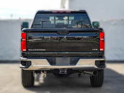 Chevrolet Silverado 2500HD LTZ 4WD Crew Cab 159" 2026 — side view