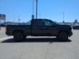 Chevrolet Silverado 2500HD ZR2 4WD Crew Cab 159" 2026 — side view
