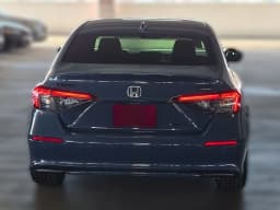 Honda Civic Sedan Hybrid Sport Touring CVT 2026 — side view