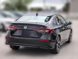 Honda Civic Sedan Hybrid Sport Touring CVT 2026 — side view