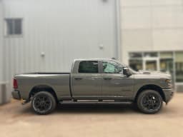 Ram 3500 Big Horn 4x4 Crew Cab 6'4" Box 2026 — side view