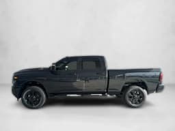 Ram 2500 Warlock 4x4 Crew Cab 6'4" Box 2027 — side view