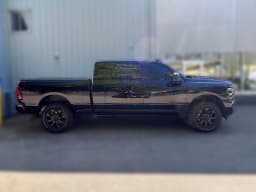 Ram 2500 Laramie 4x4 Mega Cab 6'4" Box 2026 — side view