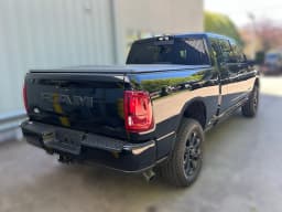 Ram 2500 Laramie 4x4 Mega Cab 6'4" Box 2026 — side view