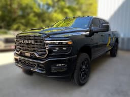 Ram 2500 Laramie 4x4 Mega Cab 6'4" Box 2026 — side view