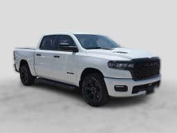 Ram 1500 Express 4x4 Crew Cab 5'7" Box 2026 — side view
