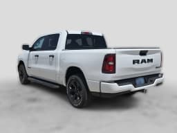 Ram 1500 Express 4x4 Crew Cab 5'7" Box 2026 — side view
