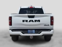 Ram 1500 Express 4x4 Crew Cab 5'7" Box 2026 — side view