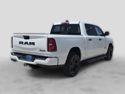 Ram 1500 Express 4x4 Crew Cab 5'7" Box 2026 — side view