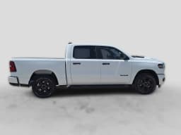 Ram 1500 Express 4x4 Crew Cab 5'7" Box 2026 — side view