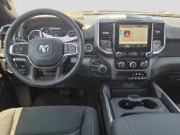 Ram 1500 Express 4x4 Crew Cab 5'7" Box 2026 — side view