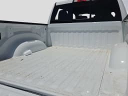 Ram 1500 Express 4x4 Crew Cab 5'7" Box 2026 — side view
