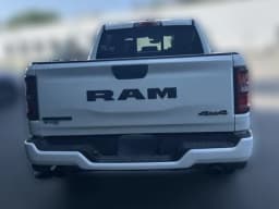 Ram 1500 Big Horn 4x4 Crew Cab 5'7" Box 2026 — side view