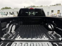 Ram 1500 Big Horn 4x4 Crew Cab 5'7" Box 2026 — side view