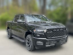 Ram 1500 Express 4x4 Crew Cab 5'7" Box 2026 — side view