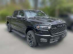 Ram 1500 Express 4x4 Crew Cab 5'7" Box 2026 — side view