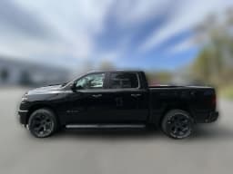 Ram 1500 Express 4x4 Crew Cab 5'7" Box 2026 — side view