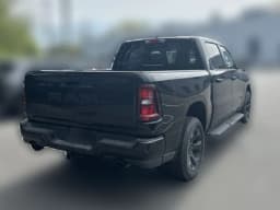 Ram 1500 Express 4x4 Crew Cab 5'7" Box 2026 — side view
