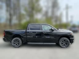 Ram 1500 Express 4x4 Crew Cab 5'7" Box 2026 — side view