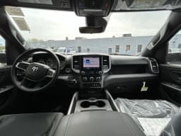 Ram 1500 Express 4x4 Crew Cab 5'7" Box 2026 — side view