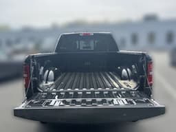 Ram 1500 Express 4x4 Crew Cab 5'7" Box 2026 — side view