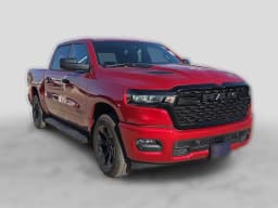 Ram 1500 Express 4x4 Crew Cab 5'7" Box 2026 — side view