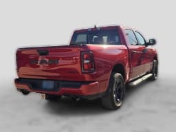 Ram 1500 Express 4x4 Crew Cab 5'7" Box 2026 — side view