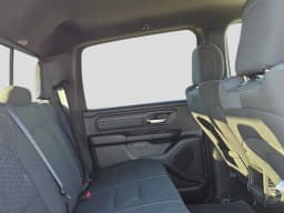 Ram 1500 Express 4x4 Crew Cab 5'7" Box 2026 — side view